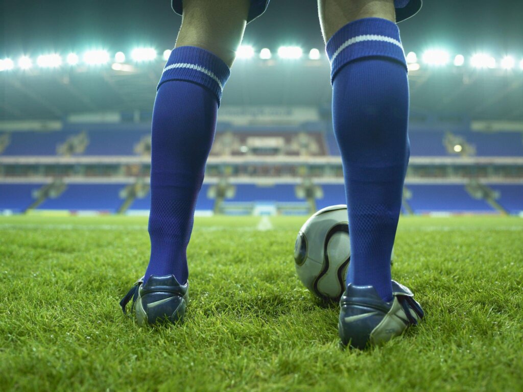 Team sports sock manufacturing with shin protection