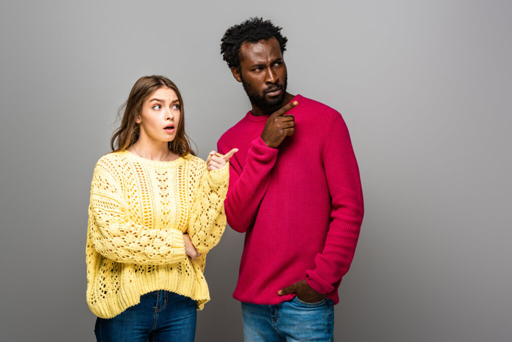 Sweater and sweatshirt side by side