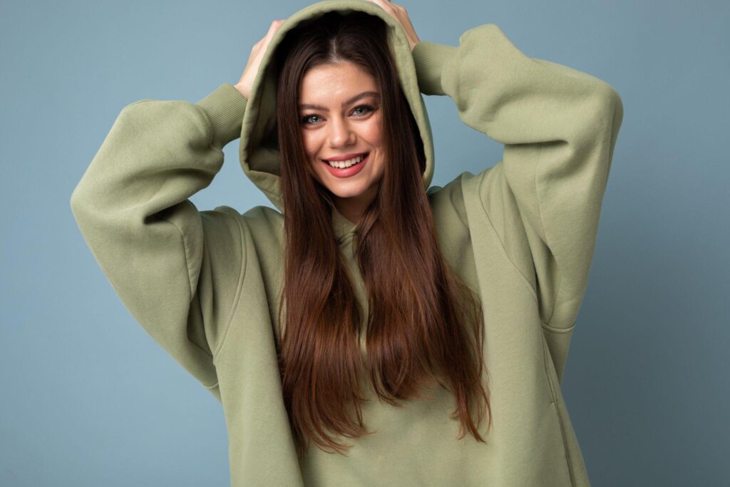 Athletic hooded sweatshirt with moisture management